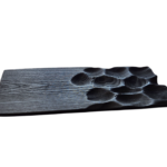 Solid wood serving plate with carved surface